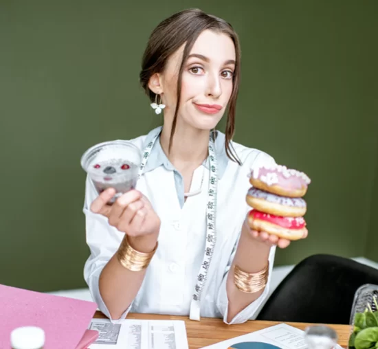 lady holding donuts