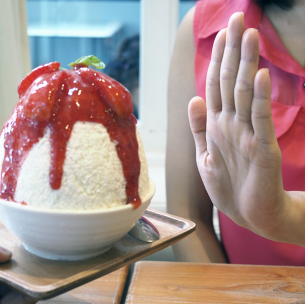 women saying no to ice cream