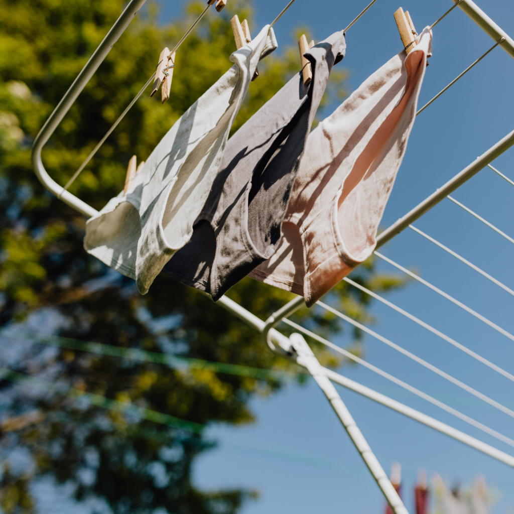 cotton underwear being dried outside on clothes hanger