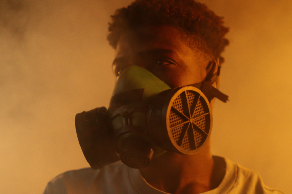 man with mask on to prevent toxic substances