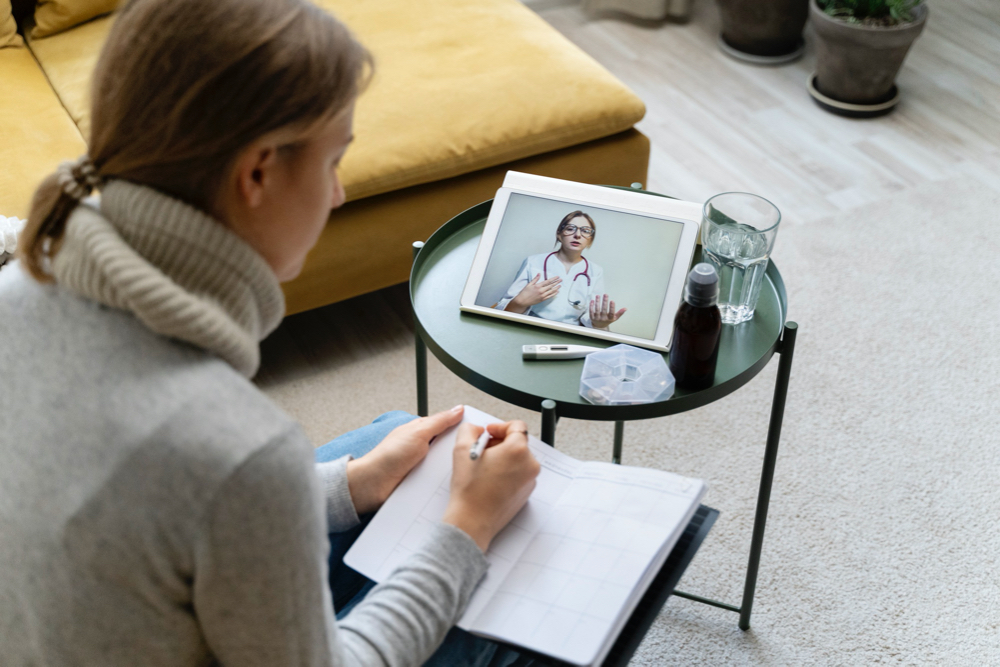 Patient having teleconsultation with doctor