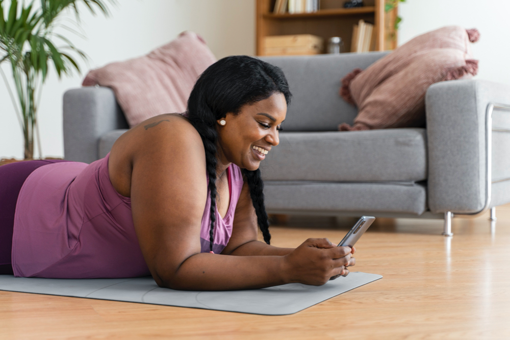 shot black woman relaxing at home