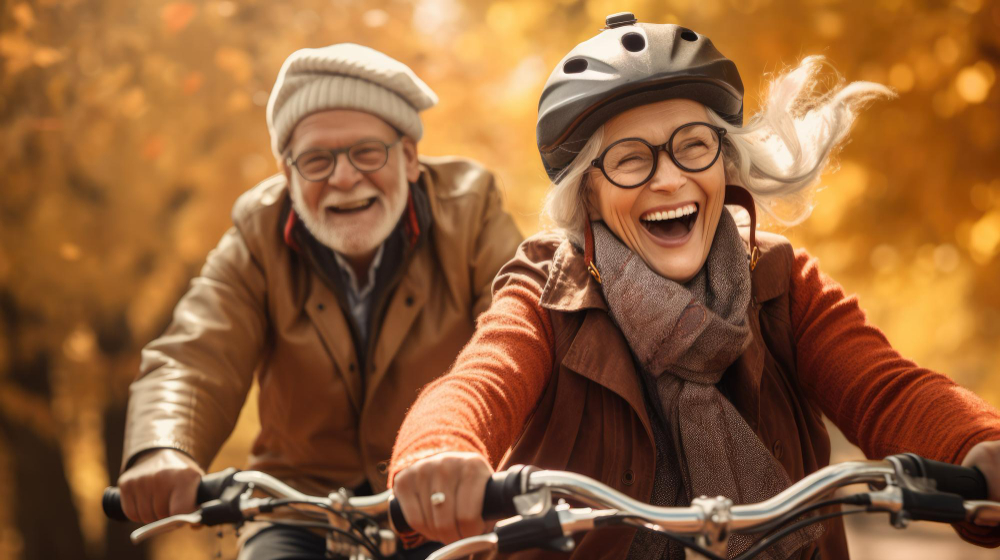 Couple of older bike riders smile Dynamic outdoor shots Joyful nature photo
