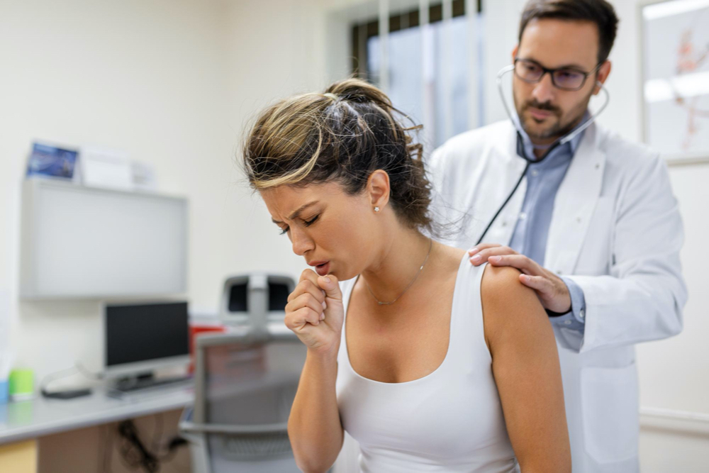 woman coughing