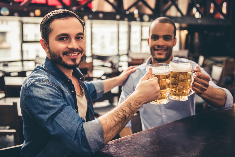 friends in pub drinking beer