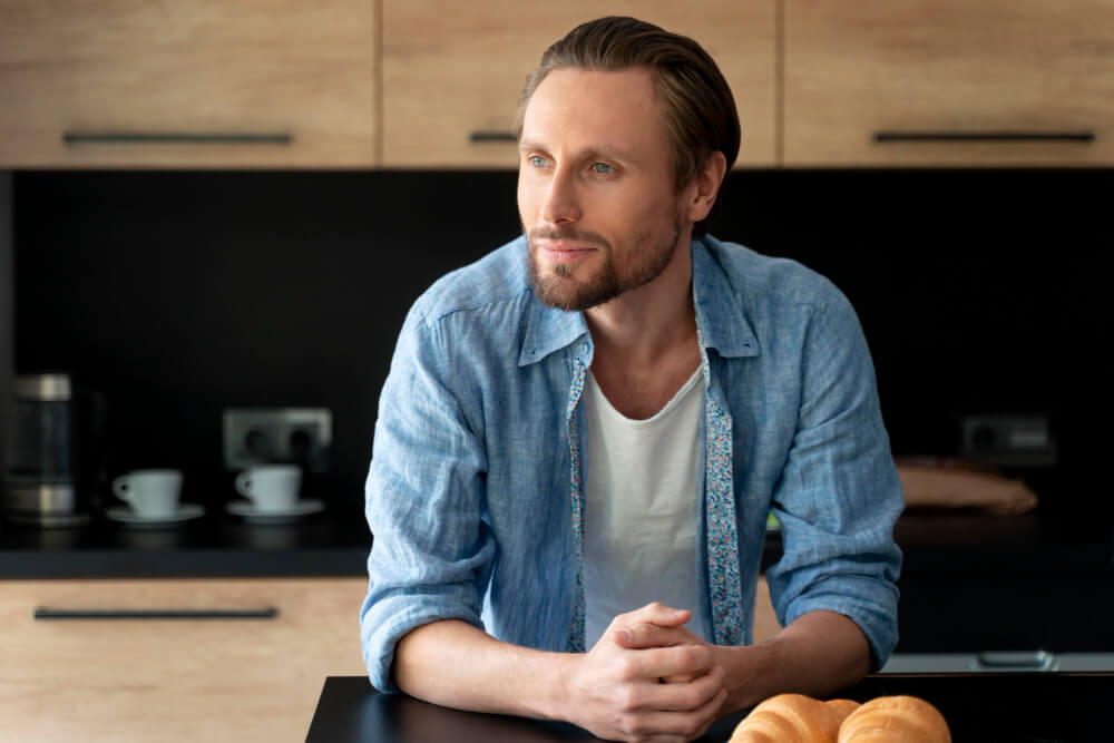 Close up on man in his kitchen
